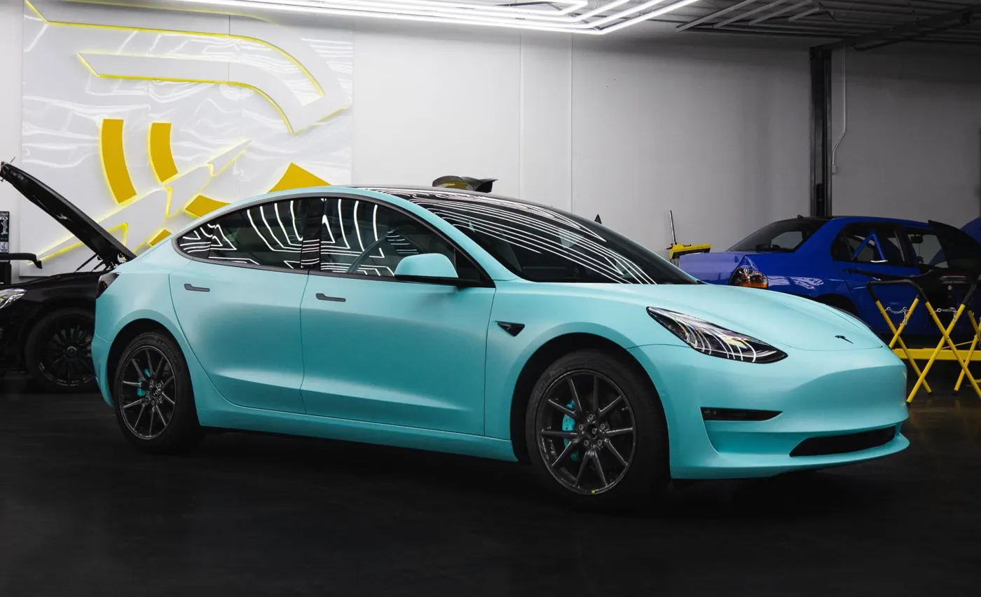 Cincinnati Car Tinting Tesla window tinting work inside the Cincinnati tint shop